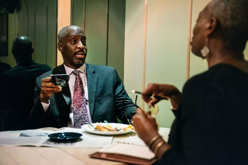 Two people from the African Mining Indaba enjoy a business lunch at one of the many dining spaces in Constantia. 