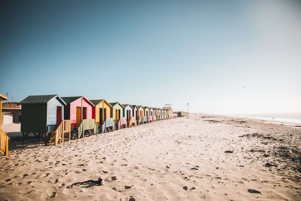 A colourful row of huts on Muizenberg beach in Cape Town